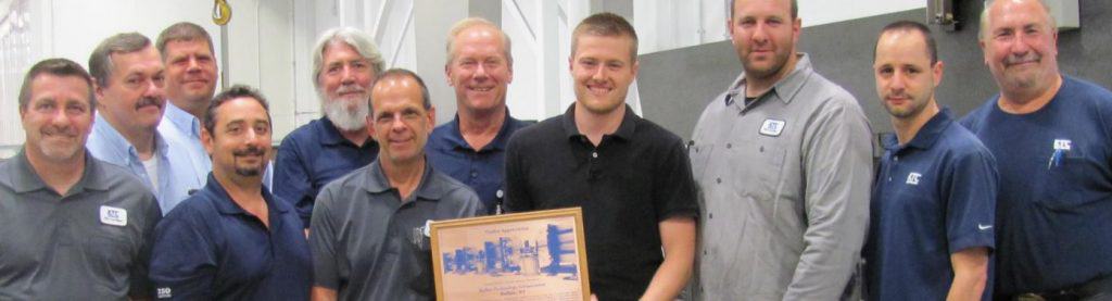 Full team photo of Keller Technology's Team Awarded Outstanding Precision Fabrication