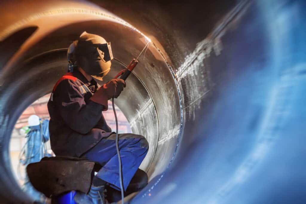 Welder welding inside a tube